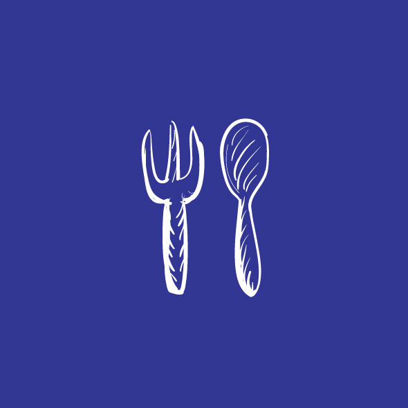 A side view of a plate of figs and berries 